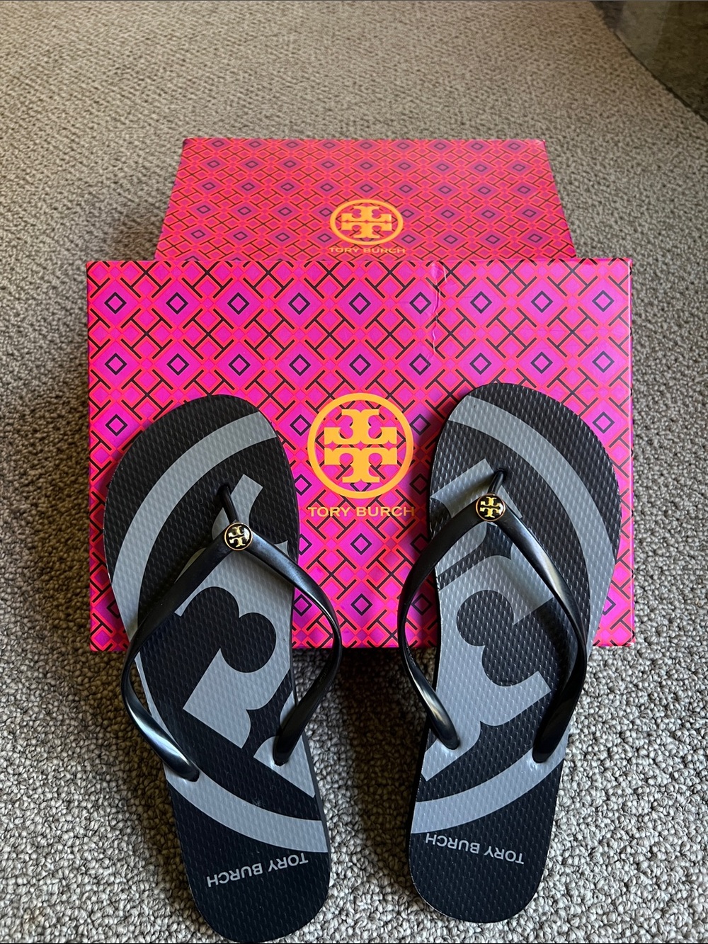 Tory Burch Black and Gray Logo Flip Flops with Black and Gold Emblem